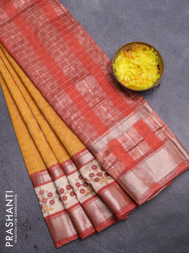 Assam silk saree mango yellow and rust shade with allover zari checked pattern and rettapet zari woven floral printed border