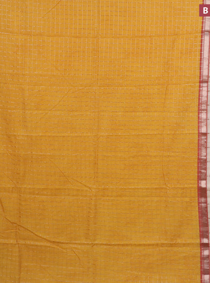 Assam silk saree mango yellow and rust shade with allover zari checked pattern and rettapet zari woven floral printed border