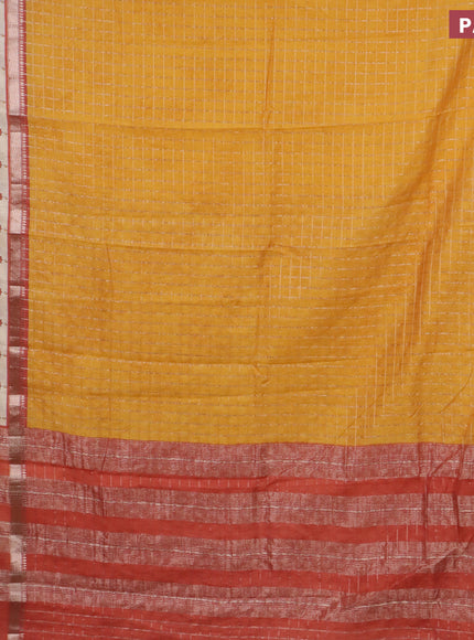 Assam silk saree mango yellow and rust shade with allover zari checked pattern and rettapet zari woven floral printed border