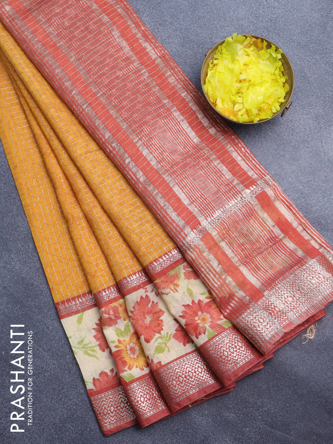 Assam silk saree mustard yellow and red shade with allover zari checked pattern & prints and rettapet zari woven floral printed border