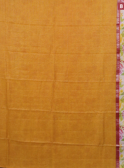 Assam silk saree mustard yellow and red with allover zari checked pattern and rettapet zari woven floral printed border