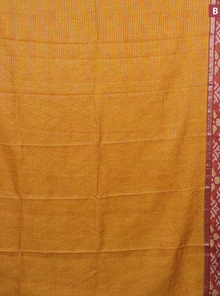 Assam silk saree mango yellow and rust shade with allover zari checked pattern and rettapet zari woven ikat printed border