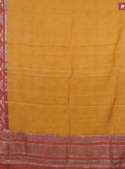 Assam silk saree mango yellow and rust shade with allover zari checked pattern and rettapet zari woven ikat printed border