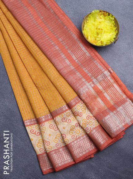 Assam silk saree mustard yellow and rust shade with allover zari checked pattern and rettapet zari woven printed border