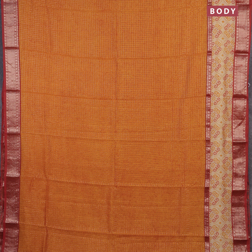 Assam silk saree mustard yellow and rust shade with allover zari checked pattern and rettapet zari woven printed border