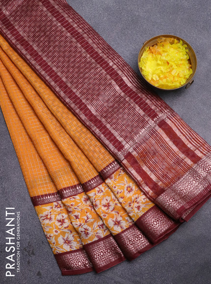 Assam silk saree mango yellow and deep maroon with allover zari checked pattern and rettapet zari woven floral printed border