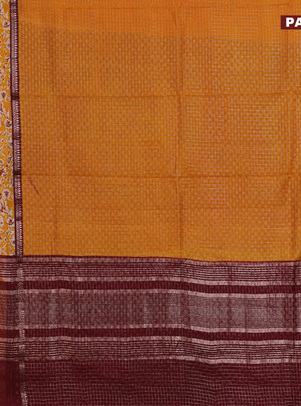 Assam silk saree mango yellow and deep maroon with allover zari checked pattern and rettapet zari woven floral printed border