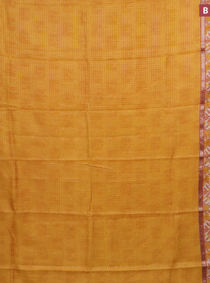 Assam silk saree mango yellow and rust shade with allover zari checked pattern and rettapet zari woven floral printed border