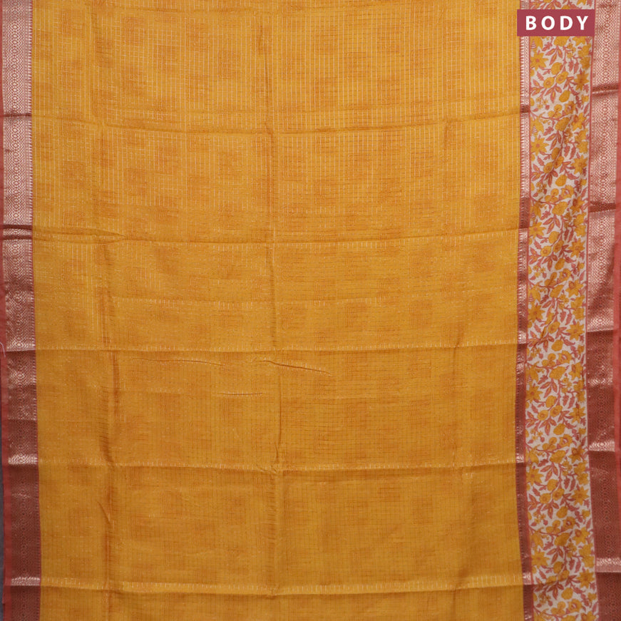 Assam silk saree mango yellow and rust shade with allover zari checked pattern and rettapet zari woven floral printed border