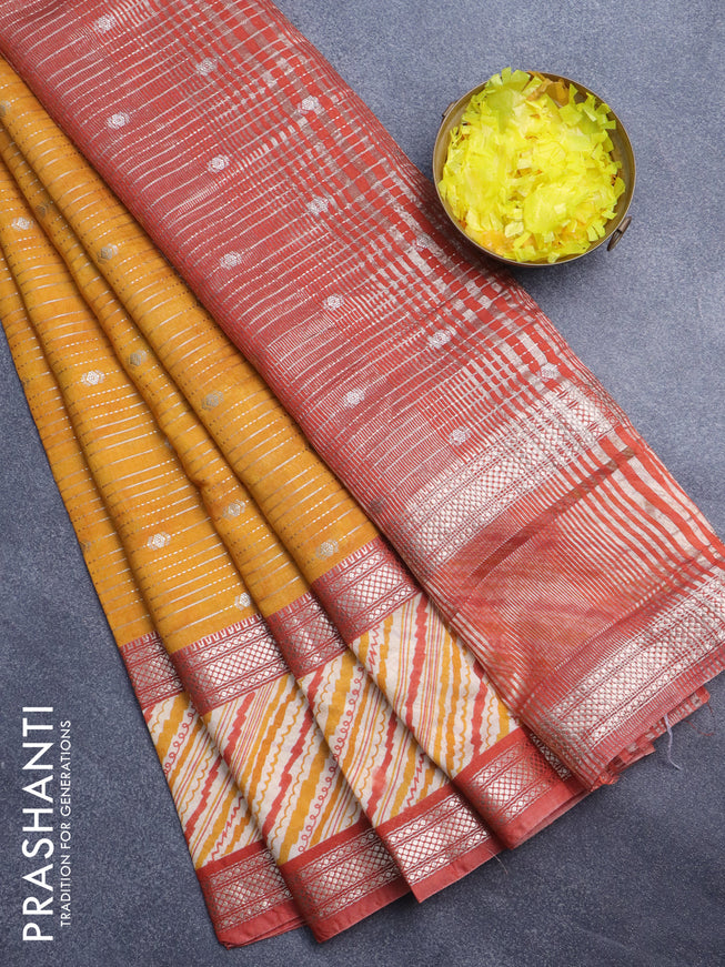 Assam silk saree mango yellow and rust shade with allover zari strips and rettapet zari woven printed border