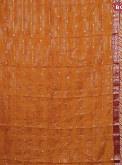 Assam silk saree mango yellow and rust shade with allover zari strips and rettapet zari woven printed border