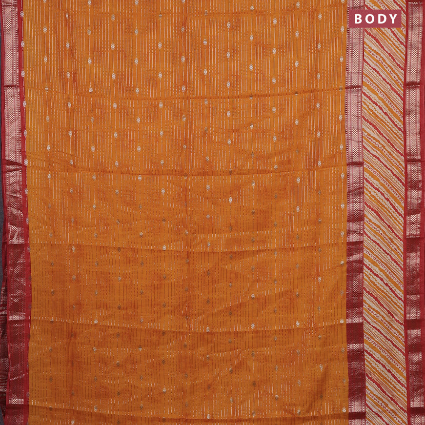 Assam silk saree mango yellow and rust shade with allover zari strips and rettapet zari woven printed border