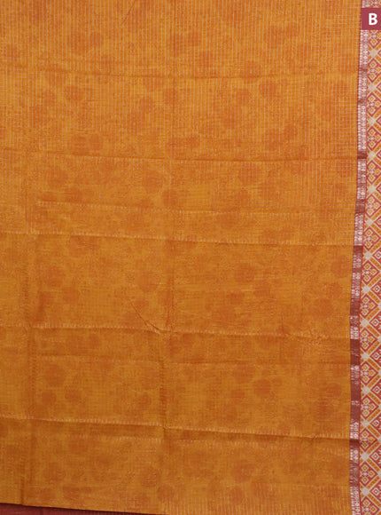 Assam silk saree mango yellow and rust shade with allover zari checked pattern and rettapet zari woven ikat printed border