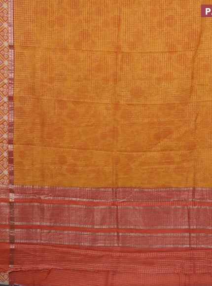 Assam silk saree mango yellow and rust shade with allover zari checked pattern and rettapet zari woven ikat printed border