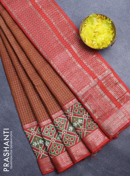 Assam silk saree rust shade and orange with allover zari checked pattern and rettapet zari woven ikat printed border