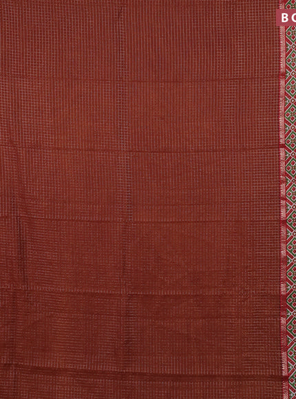 Assam silk saree rust shade and orange with allover zari checked pattern and rettapet zari woven ikat printed border