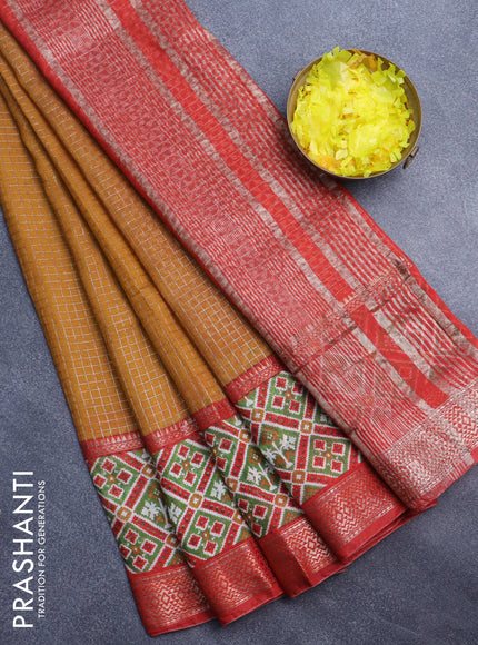 Assam silk saree dark mustard and red with allover zari checked pattern and rettapet zari woven ikat printed border