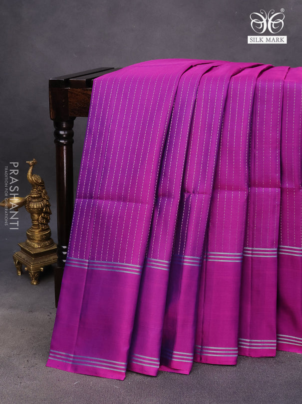 Pure soft silk saree dual shade of purple with allover zari weaves and rettapet zari woven border