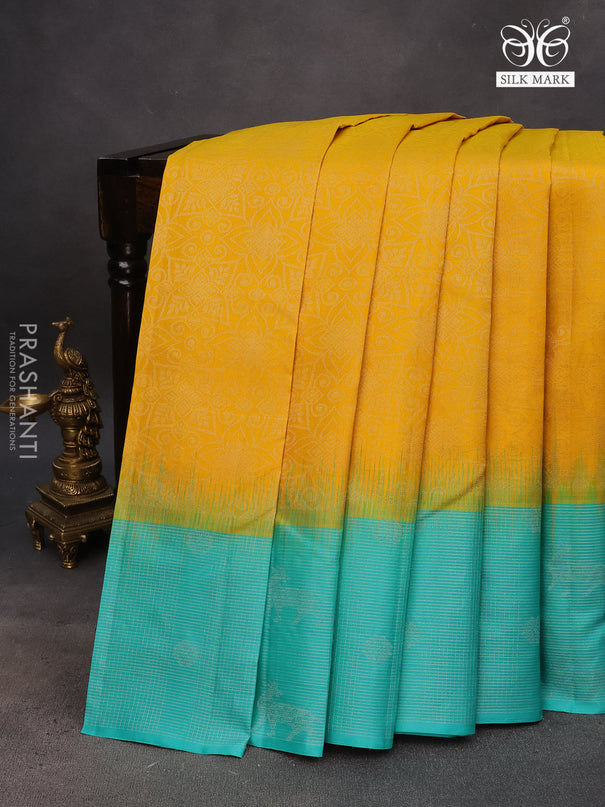 Pure soft silk saree mango yellow and teal blue with allover silver zari woven brocade weaves and rich silver zari woven border