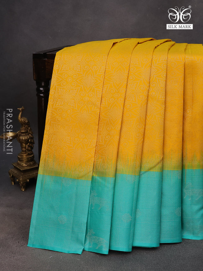 Pure soft silk saree mango yellow and teal blue with allover silver zari woven brocade weaves and rich silver zari woven border