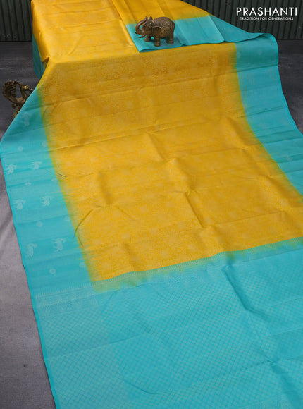 Pure soft silk saree mango yellow and teal blue with allover silver zari woven brocade weaves and rich silver zari woven border