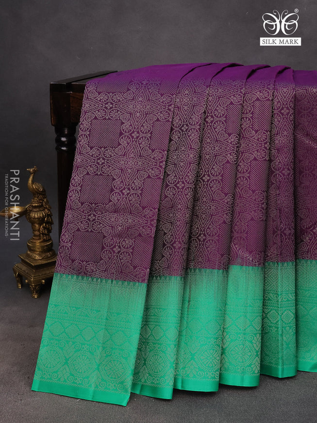 Pure soft silk saree deep purple and teal green with allover silver zari woven brocade weaves and rich silver zari woven border