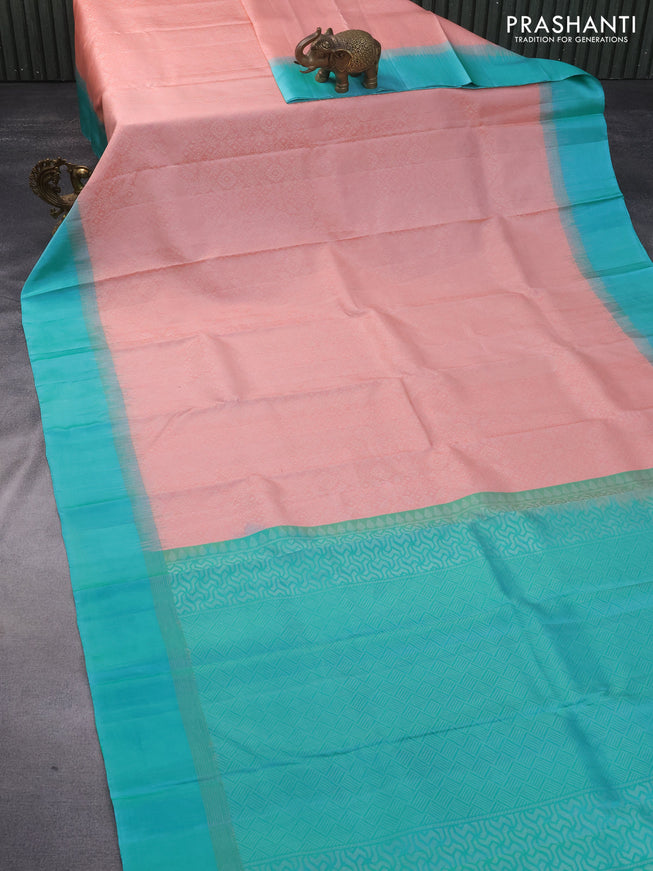 Pure soft silk saree peach shade and teal blue with allover silver zari woven brocade weaves and rich silver zari woven simple border