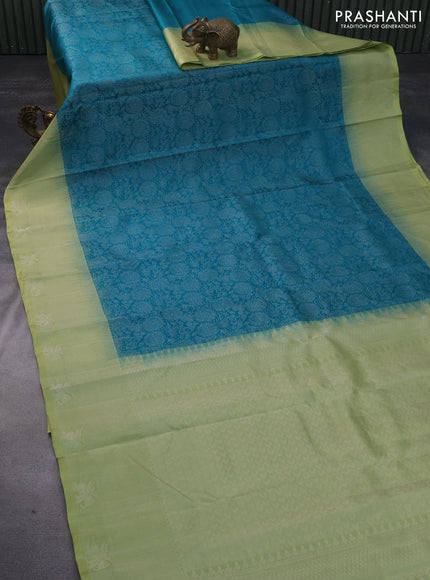 Pure soft silk saree teal blue shade and pastel green with allover silver zari woven brocade weaves and rich zari woven border