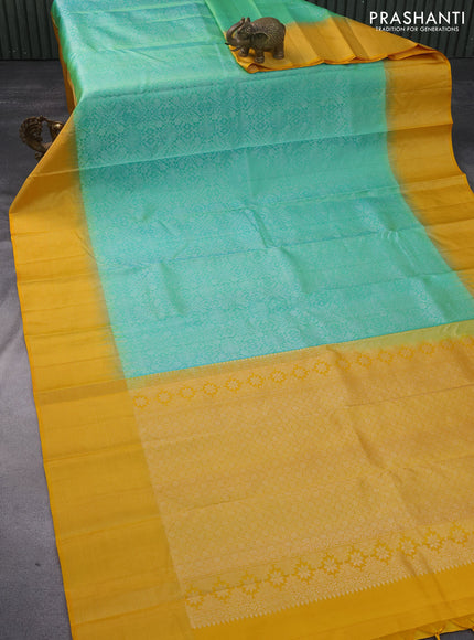 Pure soft silk saree dual shade of teal green and mango yellow with allover silver zari woven brocade weaves and rich silver zari woven border