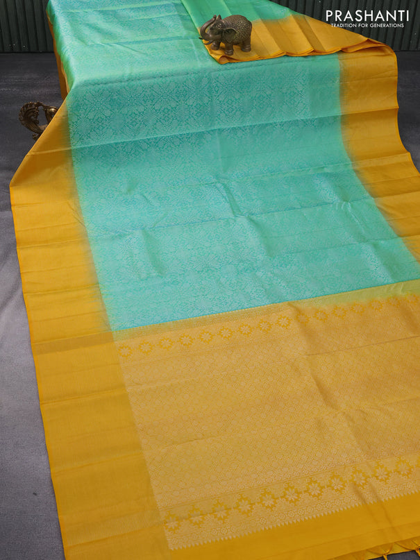 Pure soft silk saree dual shade of teal green and mango yellow with allover silver zari woven brocade weaves and rich silver zari woven border