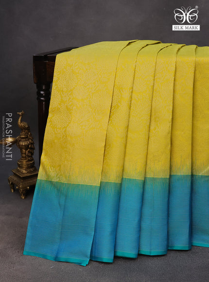 Pure soft silk saree yellow and dual shade of teal green with allover silver zari woven brocade weaves and rich silver zari woven border