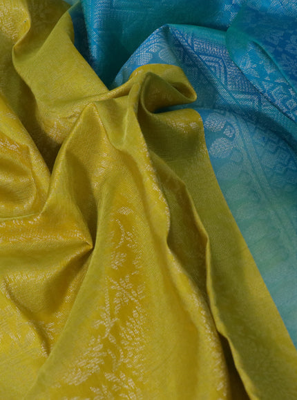 Pure soft silk saree yellow and dual shade of teal green with allover silver zari woven brocade weaves and rich silver zari woven border