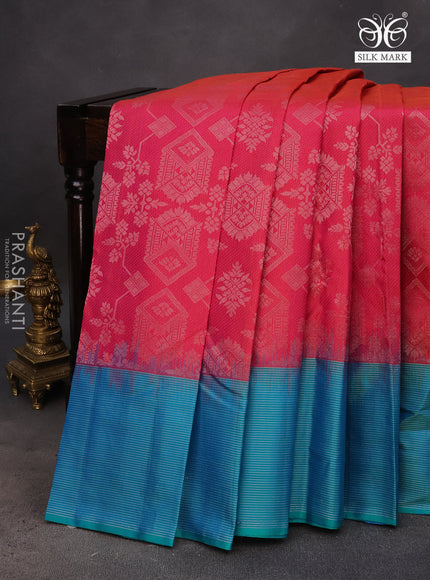 Pure soft silk saree dual shade of pinkish orange and dual shade of teal green with allover silver zari woven brocade weaves and rich silver zari woven border