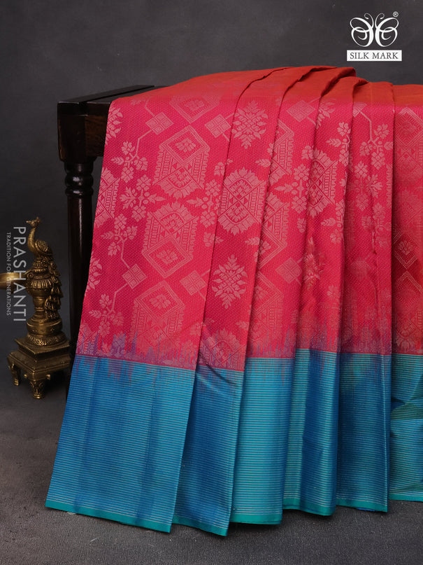 Pure soft silk saree dual shade of pinkish orange and dual shade of teal green with allover silver zari woven brocade weaves and rich silver zari woven border