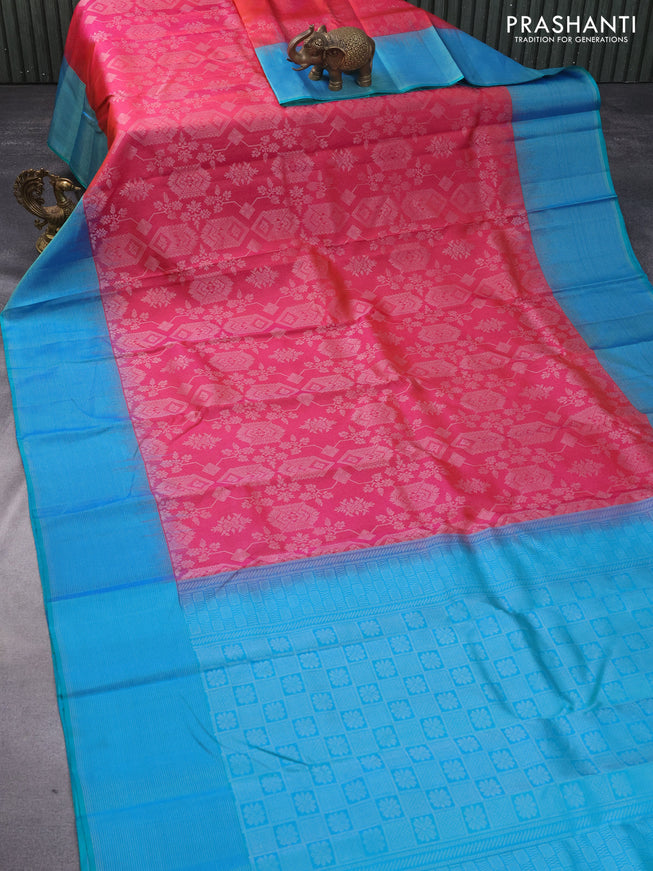 Pure soft silk saree dual shade of pinkish orange and dual shade of teal green with allover silver zari woven brocade weaves and rich silver zari woven border