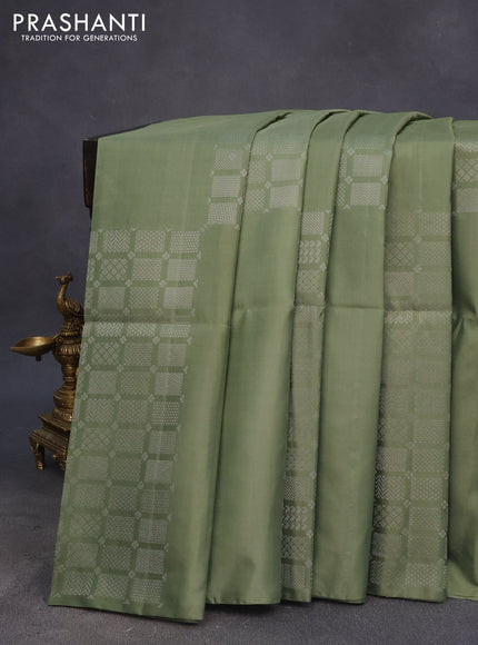 Pure soft silk saree pastel green with silver zari woven geometric buttas in borderless style