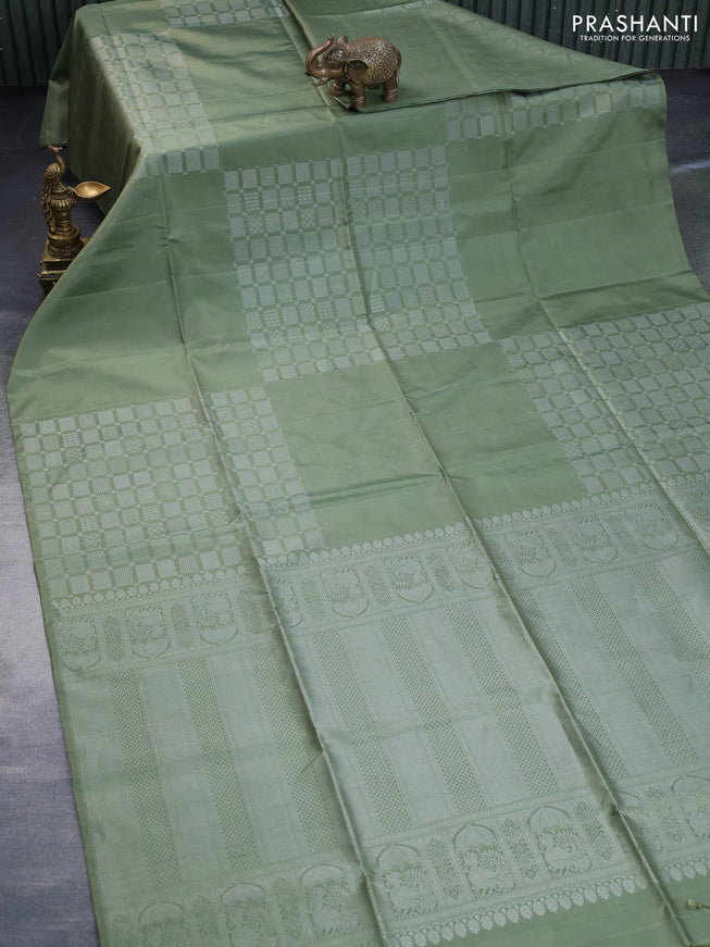 Pure soft silk saree pastel green with silver zari woven geometric buttas in borderless style