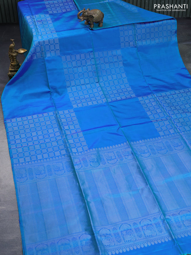 Pure soft silk saree dual shade of bluish green with silver zari woven geometric buttas in borderless style