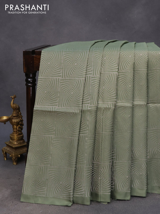 Pure soft silk saree pastel green with allover silver zari woven brocade weaves in borderless style