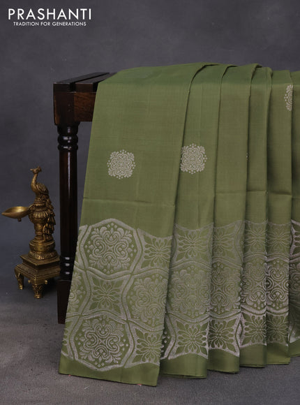 Pure soft silk saree sap green with silver zari woven buttas and long silver zari woven border