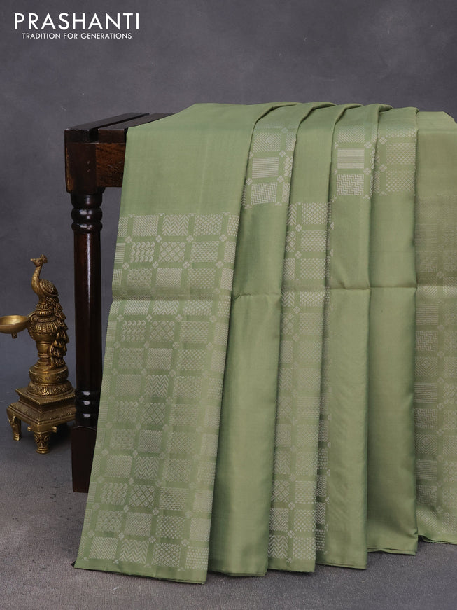 Pure soft silk saree pastel green shade with silver zari woven geometric buttas in borderless style