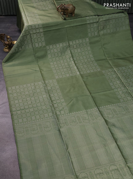 Pure soft silk saree pastel green shade with silver zari woven geometric buttas in borderless style