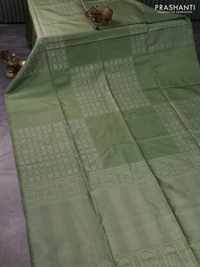 Pure soft silk saree pastel green shade with silver zari woven geometric buttas in borderless style