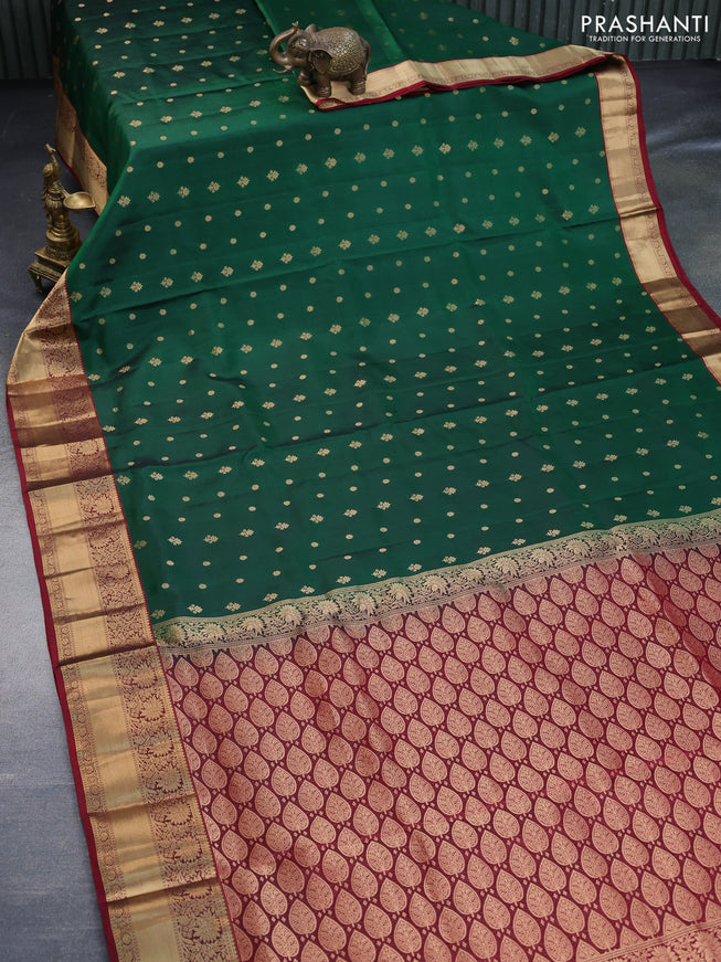 Pure soft silk saree dark green and maroon with allover zari woven buttas and zari woven border