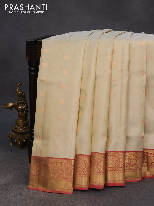 Pure soft silk saree cream and dual shade of maroon with allover zari woven buttas and zari woven border