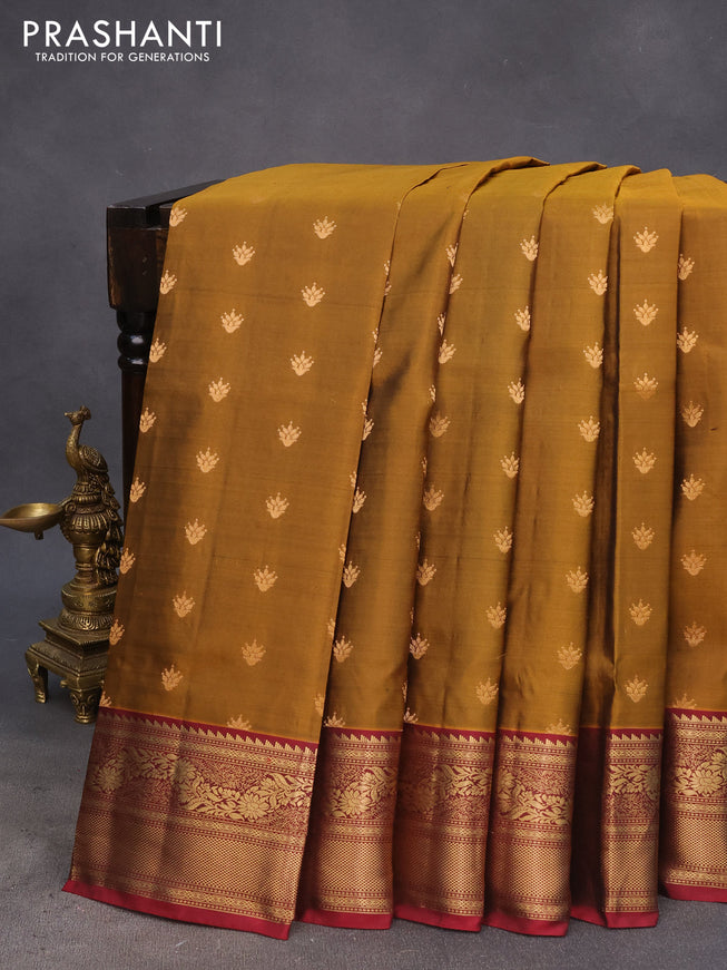 Pure soft silk saree dark mustard and maroon with allover zari woven buttas and zari woven border