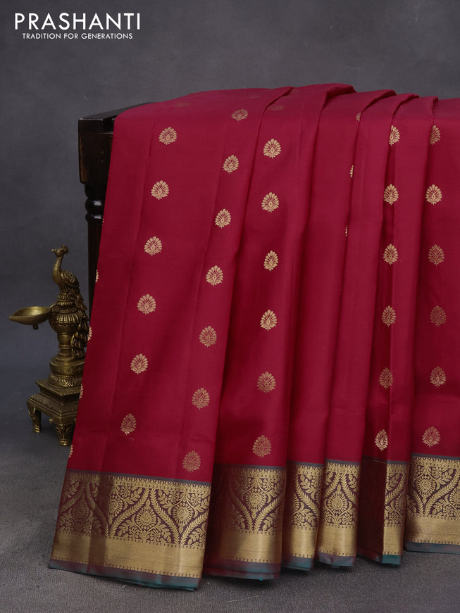 Pure soft silk saree maroon shade and dual shade of teal green with allover zari woven buttas and zari woven border