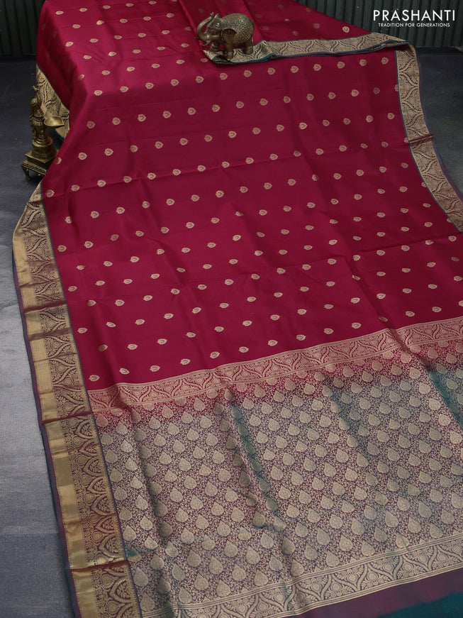 Pure soft silk saree maroon shade and dual shade of teal green with allover zari woven buttas and zari woven border