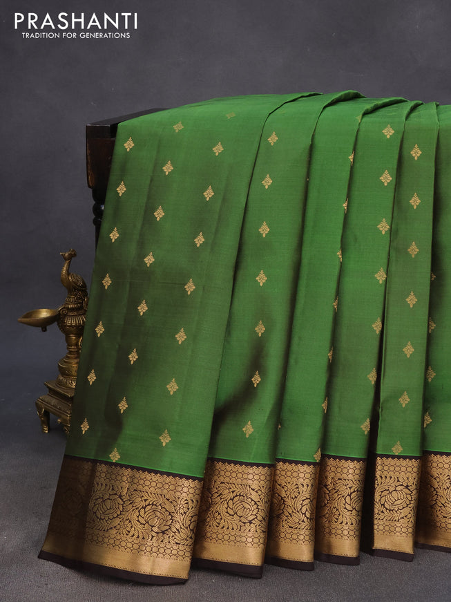 Pure soft silk saree green and dark coffee brown with allover zari woven buttas and zari woven border