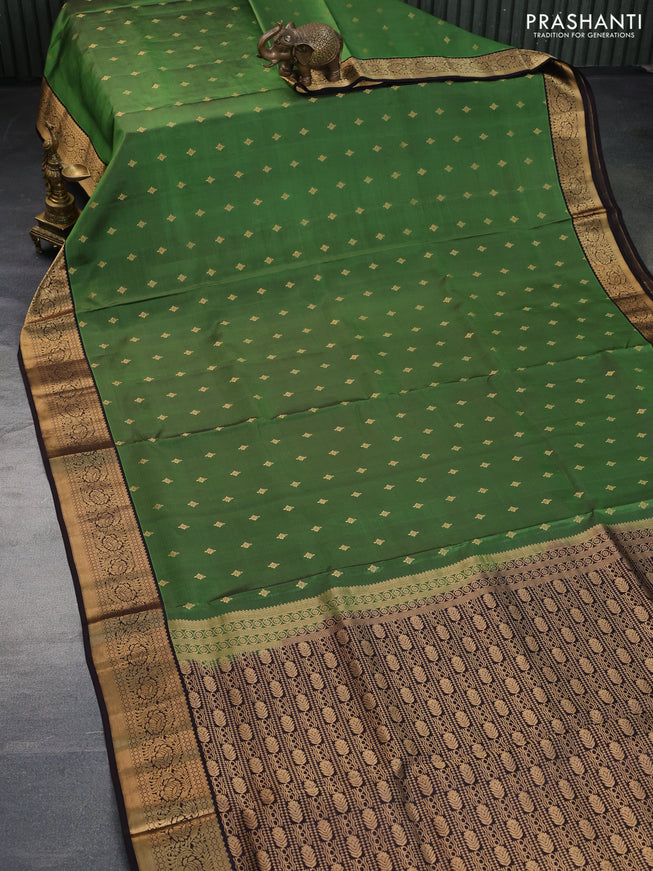 Pure soft silk saree green and dark coffee brown with allover zari woven buttas and zari woven border